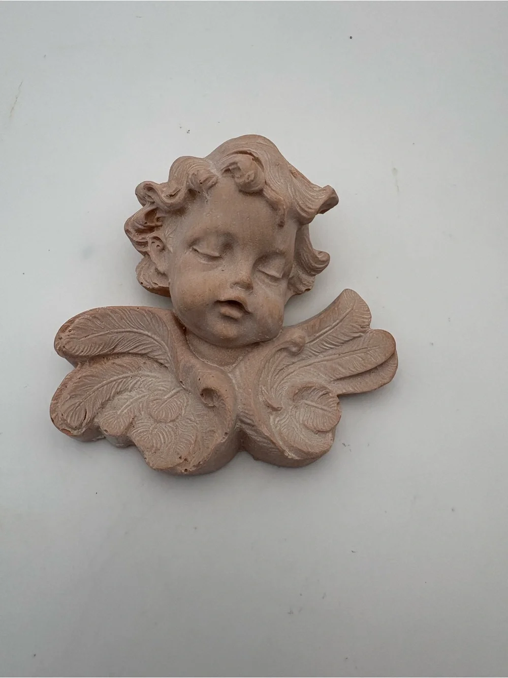 Decorative Cherub Wall Accent in Light Terracotta-colored Resin
